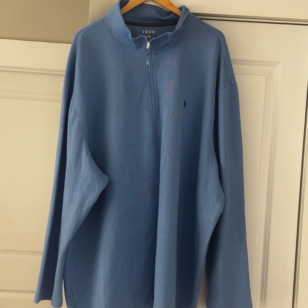 Izod Performance Comfort quarter-zip long-sleeve shirt in a light blue color.